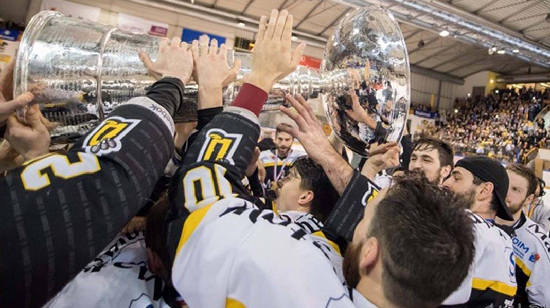 rouen dragons with trophy